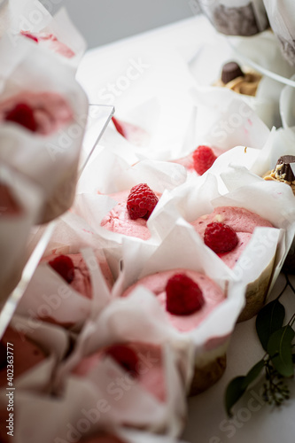 Raspberry Cupcakes Displayed at Wedding