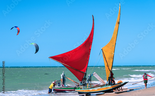 Raft or Jangada, typical sail boat from Brazil Northeast, used for fishing and, actually, for tourism transportation. Cumbuco Beach, Ceara, Brazil. photo