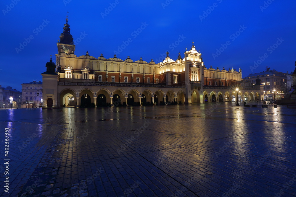 Night cityscape of Krakow Cracow old town, Main Market Square with beautiful historical building called Sukiennice