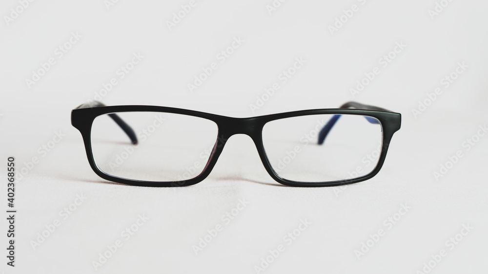Black glasses for intellectual people on white background, glasses for better reading, frontal shot Black glasses for intellectual people on white background, glasses for better reading, frontal shot
