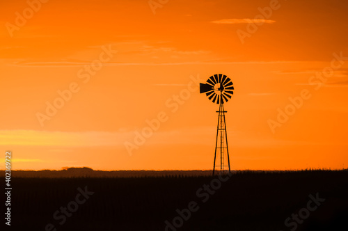 Windmill in countryside at sunset, Pampas, Patagonia,Argentina.