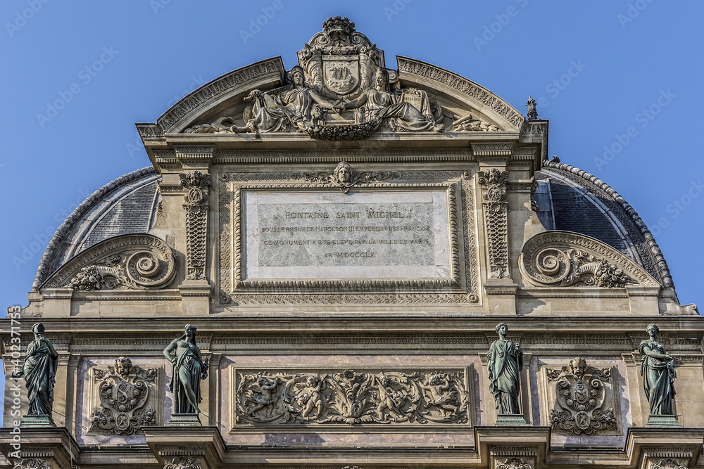 Fragment of a fountain Saint-Michel (1858 - 1860), Paris, France. Popular architectural historical landmark. Fragment of a fountain Saint-Michel (1858 - 1860), Paris, France. Popular architectural historical landmark.