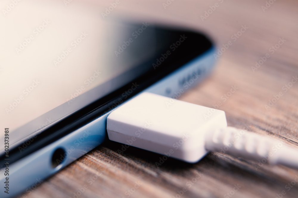 Mobile smartphone charging battery close up Mobile smartphone charging battery close up