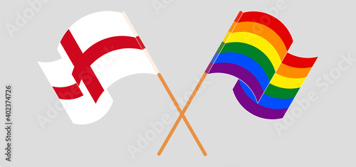 Crossed and waving flags of England and LGBTQ
