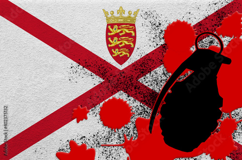 Jersey flag and MK2 frag grenade in red blood. Concept for terror attack or military operations with lethal outcome photo