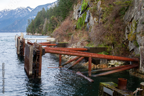 The berth for the BC Ferries dock in Horseshoe Bay, British-Columbia, uses large support beams (foundations) drilled into the rock face cliff beside it to anchor it and guide the boat in place