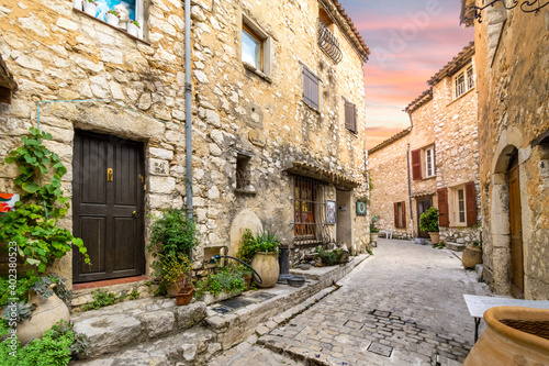 A charming, picturesque back street in the medieval walled village of Tourrettes-Sur-Loup in the Alpes-Maritimes area of Southern France.