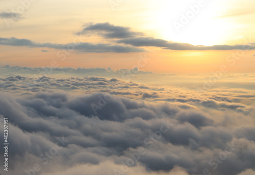 Dense fog Gathered like waves There is a big sun shining softly in the morning giving a feeling of freshness and comfort. Beautiful nature pictures Ideas for wallpaper on your computer.