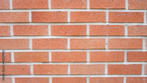The wall was built of red-brick