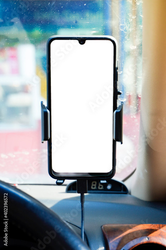 mobile phone with blank screen in car windshield holder