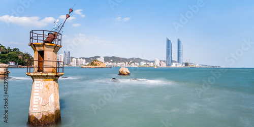 Seaside scenery of Shimao twin towers in Xiamen, Fujian, China photo