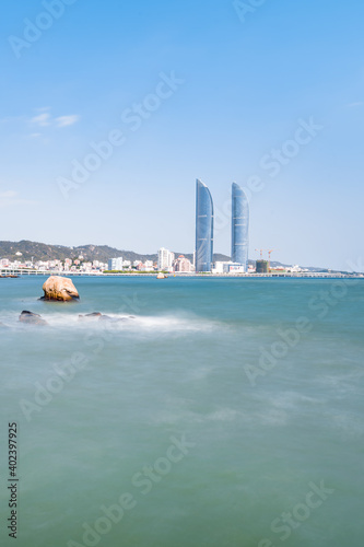 Seaside scenery of Shimao twin towers in Xiamen, Fujian, China photo