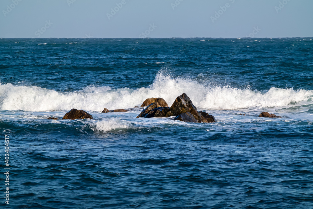 Rock and rough wave of the sea in Gijang-gun, Busan, South Korea Rock and rough wave of the sea in Gijang-gun, Busan, South Korea