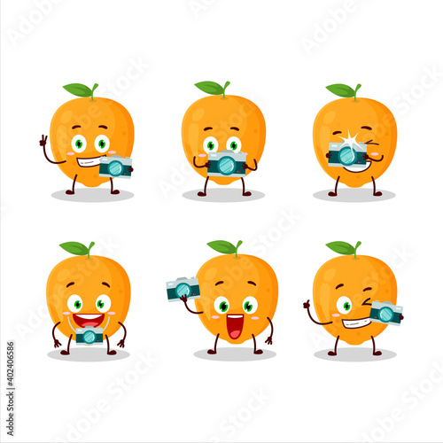 Fototapeta Naklejka Na Ścianę i Meble -  Photographer profession emoticon with orange fruit cartoon character
