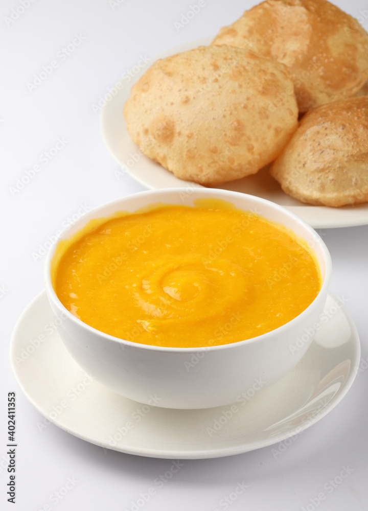Indian Food - Aamras is a sweet dish made from the pulp of the Alphonso mango fruit. Served with hot puri/poori. Sweet Mango puree garnished with Kashmiri Saffron. Aam Ras Puri OR Alphonso Mango pulp Indian Food - Aamras is a sweet dish made from the pulp of the Alphonso mango fruit. Served with hot puri/poori. Sweet Mango puree garnished with Kashmiri Saffron. Aam Ras Puri OR Alphonso Mango pulp