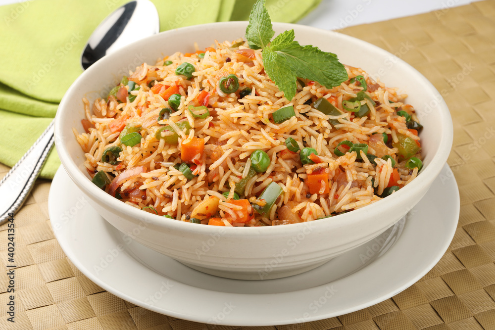 Veg Schezwan Fried Rice Vegetarian Szechuan Rice is indo-chinese cuisine dish with bell peppers, green beans, carrot.
Veg Schezwan Fried Rice Vegetarian Szechuan Rice is indo-chinese cuisine dish with bell peppers, green beans, carrot.