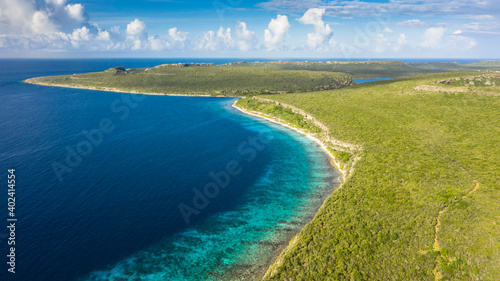 Aerial view above scenery of Curacao  Caribbean with ocean  coast  hills