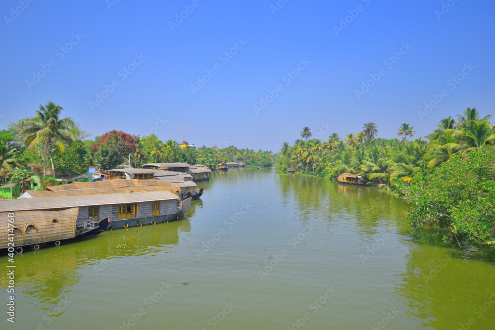 House boats kept on the banks of kumarakom backwaters in Kerala.	