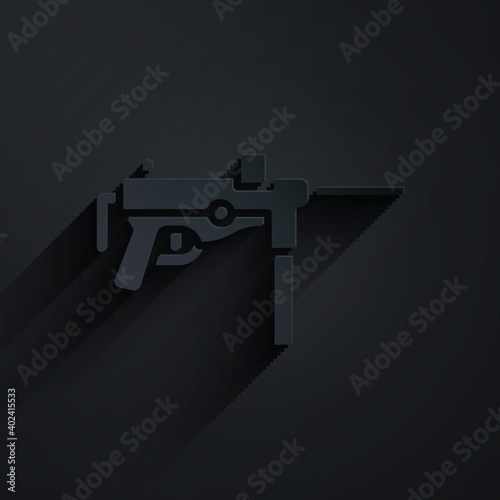 Paper cut Submachine gun M3, Grease gun icon isolated on black background. Paper art style. Vector.