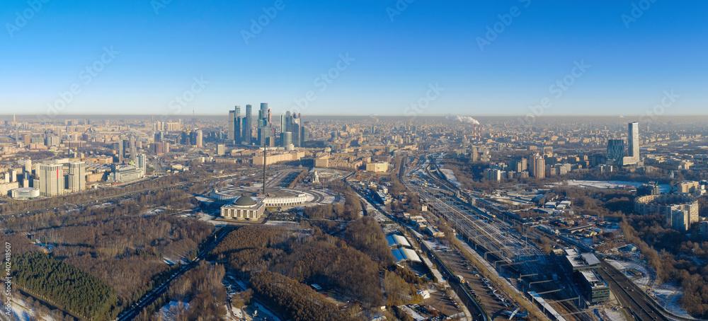 Panoramic aerial view of the city, Victory park and Moscow city at sunny winter day. Moscow, Russia.