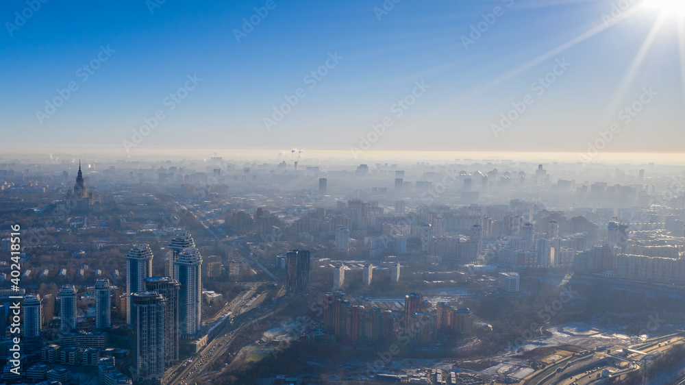 Contre-jour aerial view of Moscow at sunny winter day. Russia. Contre-jour aerial view of Moscow at sunny winter day. Russia.