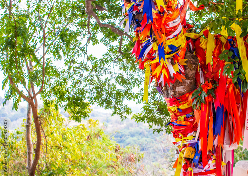 Buddhist ribbons on the way to the Thai temple Wat Khao Tabaek in Siracha Thailand Asia photo