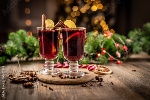 Glass cups with red mulled wine photo