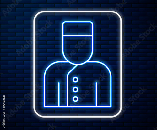 Glowing neon line Concierge icon isolated on brick wall background. Vector.