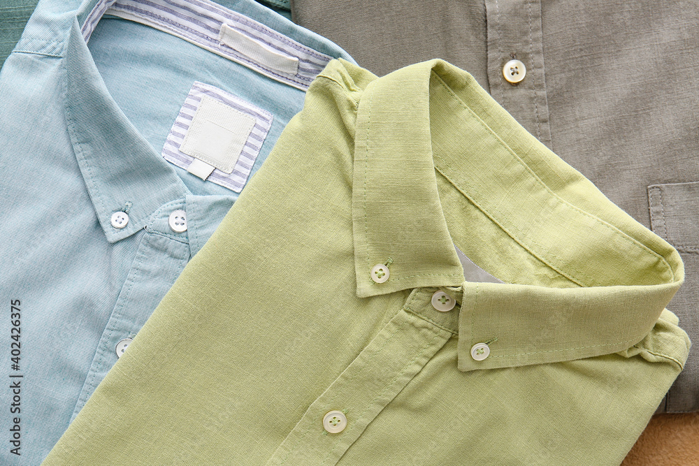 Folded male shirt as background Folded male shirt as background