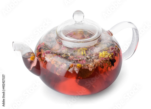 Teapot with floral tea on white background