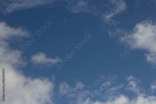    Blue sky with cloud background.Natural cloudscape background  texture. Wide Horizontal Wallpaper With Copy Space Backdrop.
