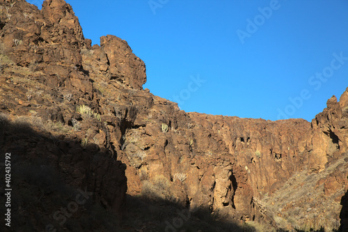 Gran Canaria, landscapes along the hiking route around the ravive Barranco Hondo, The Deep Ravine at the southern part of the island, full of caves and grottoes, close to small village Juan Grande