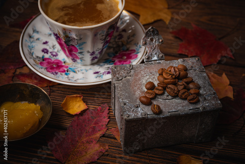 Still life- autumn motif. Breakfast- cup of coffee is on the table