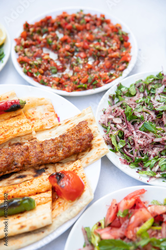 Traditional Turkish grilled shish kebab or kebap. Delicious Adana kebab in Turkish Restaurant