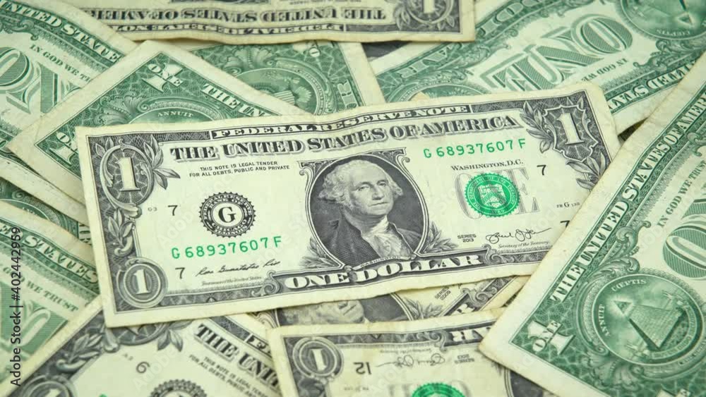 dollar bills banknotes slowly turning spinning close one from above fullscreen