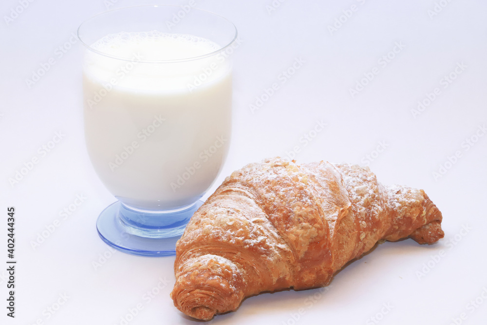 Bicchiere di latte. e cornetto, Glass of milk and croissant Bicchiere di latte. e cornetto, Glass of milk and croissant
