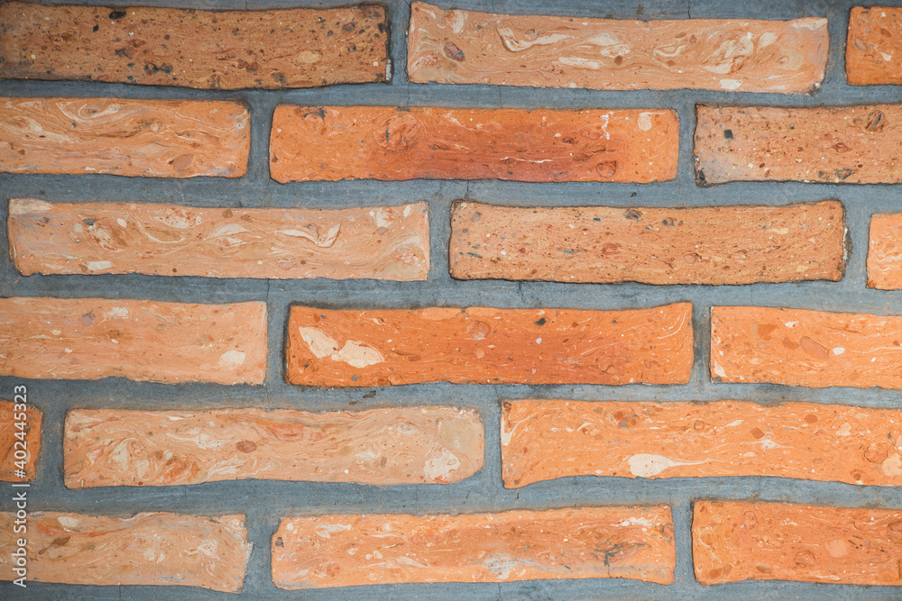Fototapeta premium close-up of a red brick wall. for invitation or event card