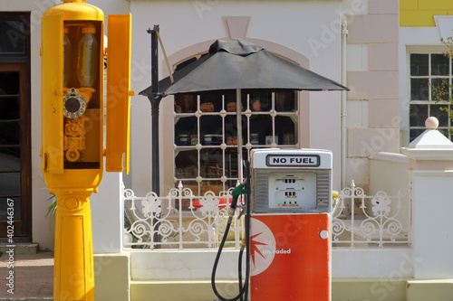 old bright vintage fuel pumps at a roadside vendor