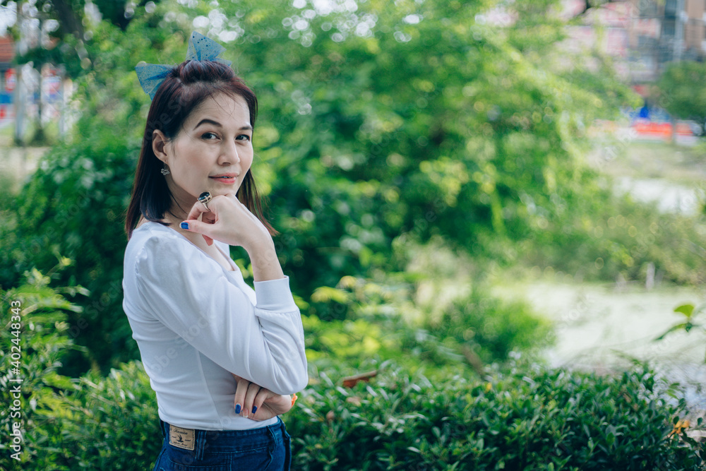 Beautiful asian woman age 40 years old with nature background outdoors Beautiful asian woman age 40 years old with nature background outdoors