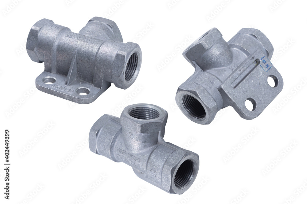 Valve by-pass dual-line pneumatic brake system of a truck on an isolated white background Valve by-pass dual-line pneumatic brake system of a truck on an isolated white background