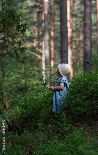 girl standing in a Swedish forest