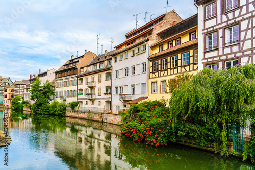 Colorful half timbered houses on the banks of River Ill in Strasbourg  Alsace region  France
