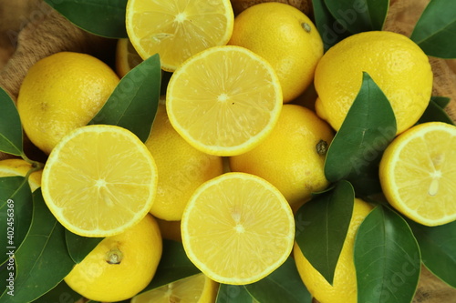 Group of lemons with leaves, isolated on background