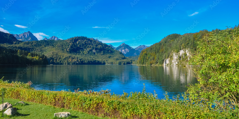 Panoramic view of a mountain lake in the Alps