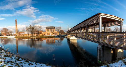 panoramic view footbridge named puchsteg above Mur river in Styria, Graz