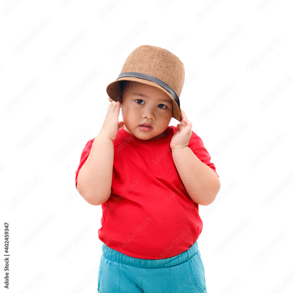 Cute healthy boy with a hat and a red t-shirt. Isolated on white background. Cute healthy boy with a hat and a red t-shirt. Isolated on white background.