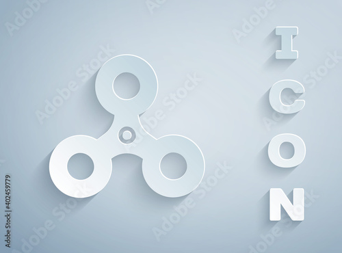 Paper cut Fidget spinner icon isolated on grey background. Stress relieving toy. Trendy hand spinner. Paper art style. Vector.