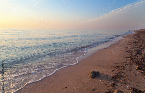 Sea beach at sunrise. Azov sea.