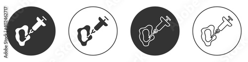 Black GMO syringe icon isolated on white background. Genetically modified organism acronym. Dna food modification. Circle button. Vector.