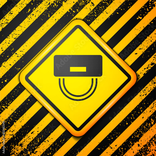 Black Bellboy hat icon isolated on yellow background. Hotel resort service symbol. Warning sign. Vector.